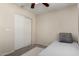 Neutral bedroom with a closet and carpet flooring offering a cozy space at 14008 N 61St Ave, Glendale, AZ 85306