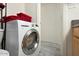Convenient laundry area with a modern washer and dryer, complete with storage space at 14203 N 19Th Ave # 1031, Phoenix, AZ 85023