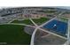 New construction community featuring playground, basketball court, common areas, and walking paths at 15510 W Deanne Dr, Waddell, AZ 85355