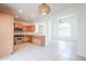 Bright kitchen featuring stainless steel appliances, tile floors, and wood cabinetry at 16017 N 19Th Dr, Phoenix, AZ 85023