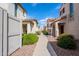 A charming street view showcasing lovely homes with desert landscaping and inviting walkways at 16017 N 19Th Dr, Phoenix, AZ 85023