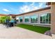 Backyard featuring well-maintained artificial turf at 16201 S 29Th Ave, Phoenix, AZ 85045