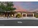 Charming single-story home with desert landscaping, a red tile roof, and a two-car garage in a tranquil neighborhood at 16201 S 29Th Ave, Phoenix, AZ 85045