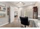 Bright home office featuring a white desk, comfortable chair, and natural light at 16201 S 29Th Ave, Phoenix, AZ 85045