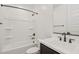 Clean bathroom showcasing a tub, toilet, vanity, and contemporary fixtures at 1913 W Lariat Ln, Phoenix, AZ 85085