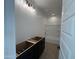 Bathroom with shower/tub combo and dark vanity cabinet with modern fixtures at 1913 W Lariat Ln, Phoenix, AZ 85085