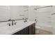 Bathroom featuring double sink vanity with black hardware and shower over tub at 1913 W Lariat Ln, Phoenix, AZ 85085