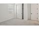 Cozy bedroom with closet and sliding door and large window that offers natural light at 1913 W Lariat Ln, Phoenix, AZ 85085