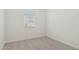 Small bedroom includes carpet, white walls, and window with blinds at 1913 W Lariat Ln, Phoenix, AZ 85085
