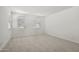 Bedroom including carpet, white walls, and two windows with blinds at 1913 W Lariat Ln, Phoenix, AZ 85085