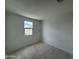 This is a bedroom with white walls and one window looking outside at 1913 W Lariat Ln, Phoenix, AZ 85085