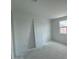 A white door and a window can be seen in this bedroom photo at 1913 W Lariat Ln, Phoenix, AZ 85085