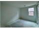 Blank canvas bedroom with a neutral palette, ready for customization and design with large window at 1913 W Lariat Ln, Phoenix, AZ 85085