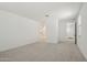 Bonus room including carpet, white walls, and multiple doorways at 1913 W Lariat Ln, Phoenix, AZ 85085