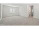 Bonus room including carpet, white walls, and window with blinds at 1913 W Lariat Ln, Phoenix, AZ 85085