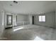 Upstairs bonus room offers versatile space for living or office with a large window providing natural light at 1913 W Lariat Ln, Phoenix, AZ 85085
