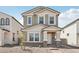 Charming two-story home with gray stucco, stone accents, and a welcoming front porch at 1913 W Lariat Ln, Phoenix, AZ 85085