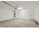 Spacious garage with concrete floors, ample space, and essential utilities at 1913 W Lariat Ln, Phoenix, AZ 85085