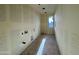 Laundry room with window and hookups for sink and washer/dryer at 1913 W Lariat Ln, Phoenix, AZ 85085