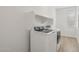 Laundry room featuring washer, dryer, and shelf at 1913 W Lariat Ln, Phoenix, AZ 85085