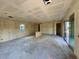Spacious living room with sliding glass doors and a large window for natural light at 1913 W Lariat Ln, Phoenix, AZ 85085