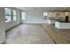 The kitchen and living room have an open concept floor plan and are filled with lots of natural light at 1913 W Lariat Ln, Phoenix, AZ 85085