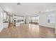 Open living space with tile floors, and a kitchen island featuring stainless appliances at 1913 W Lariat Ln, Phoenix, AZ 85085