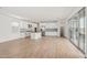 Open living space with tile floors, and a kitchen island featuring stainless appliances at 1913 W Lariat Ln, Phoenix, AZ 85085