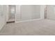 Spacious loft area with carpet and railing, creating an open, airy feel at 1913 W Lariat Ln, Phoenix, AZ 85085