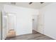 Bedroom featuring wood-look floors, and multiple doorways at 20455 N Lemon Drop Dr, Maricopa, AZ 85138