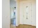 Bright and welcoming entryway with a decorative glass front door and views into the open floor plan at 20455 N Lemon Drop Dr, Maricopa, AZ 85138