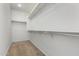 Walk-in closet with shelving providing ample storage space at 20866 W Hamilton St, Buckeye, AZ 85396