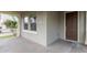 Inviting front porch showcasing the home's entrance, windows, and architectural details at 20866 W Hamilton St, Buckeye, AZ 85396
