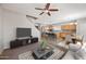 Open-concept living area with a modern kitchen, cozy dining space, and stylish furnishings at 2109 S Luther --, Mesa, AZ 85209