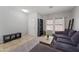 Inviting living room showcasing neutral walls, tile entry, carpeted floors, and natural light at 2109 S Luther --, Mesa, AZ 85209