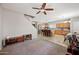 An open-concept living area connects the kitchen, living room, and dining area at 2109 S Luther --, Mesa, AZ 85209
