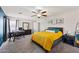 Bright primary bedroom with a ceiling fan, neutral walls, carpeted floor and home office at 2109 S Luther --, Mesa, AZ 85209