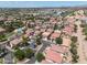 Aerial view showcasing a residential community with mature trees and a community pool at 2109 S Luther --, Mesa, AZ 85209