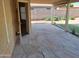 Extended flagstone patio overlooks a low-maintenance desert backyard at 2434 S Colleen --, Mesa, AZ 85210
