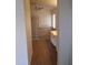 Hall bathroom showcasing a glass block shower and ample vanity space at 2434 S Colleen --, Mesa, AZ 85210