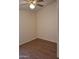 Neutral bedroom featuring wood-look floors and a ceiling fan, offering a bright and cozy space at 2434 S Colleen --, Mesa, AZ 85210