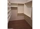 Walk-in closet with custom storage solutions and built-in shelving at 2434 S Colleen --, Mesa, AZ 85210