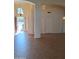 Bright foyer with high ceilings, tile flooring, and an open entryway at 2434 S Colleen --, Mesa, AZ 85210