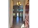Inviting home entryway with a view into the living area and tile flooring at 2434 S Colleen --, Mesa, AZ 85210