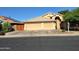 Charming home featuring a three-car garage, desert landscaping, and a tile roof at 2434 S Colleen --, Mesa, AZ 85210