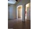 Spacious living area features an arched entrance with ample natural light and neutral colors at 2434 S Colleen --, Mesa, AZ 85210
