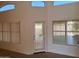 Living room featuring window treatments, tile flooring, and natural light at 2434 S Colleen --, Mesa, AZ 85210