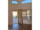 Bright living room featuring windows, tile flooring, and neutral walls at 2434 S Colleen --, Mesa, AZ 85210