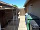 Side yard featuring large garbage bins at 2434 S Colleen --, Mesa, AZ 85210