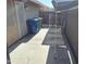 View of side yard with patio extension and metal covering at 2434 S Colleen --, Mesa, AZ 85210